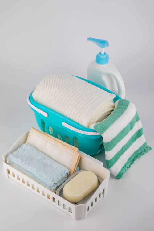 按压清洁剂毛巾清洁洗浴洗护用品摄影图 摄影图